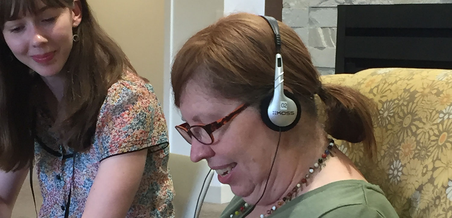 Woman listening to music in headphones
