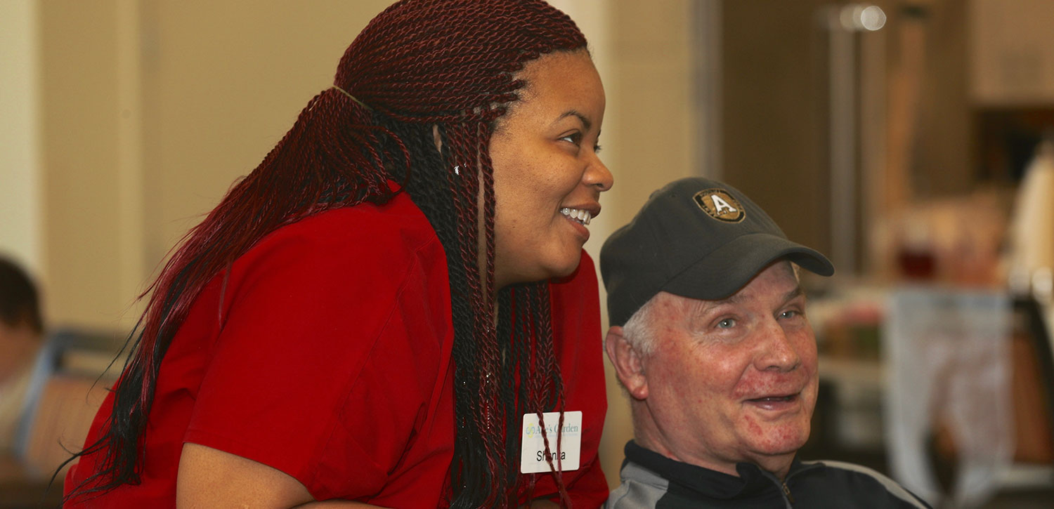 caregiver and man smiling