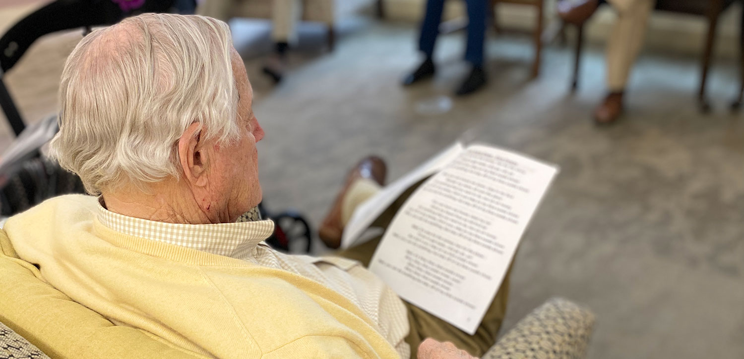 Senior man at a sermon in his retirement community