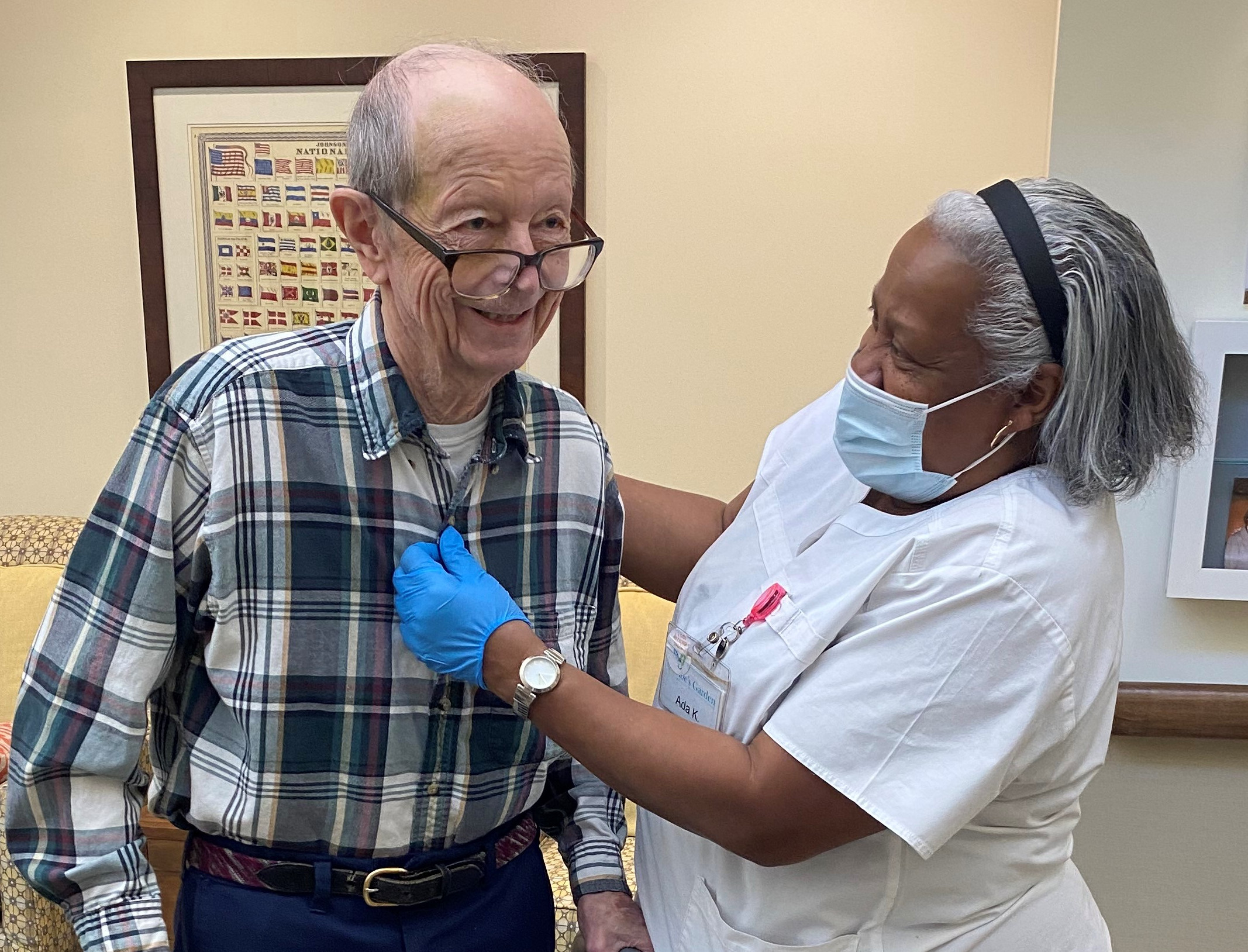 Bob Bowers AGAH crop Abe's Garden at Home patient recieves medical care from health care professional