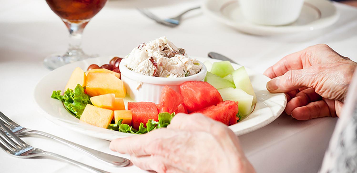 Delicious meal being served in the dining room at Abe's Garden Community