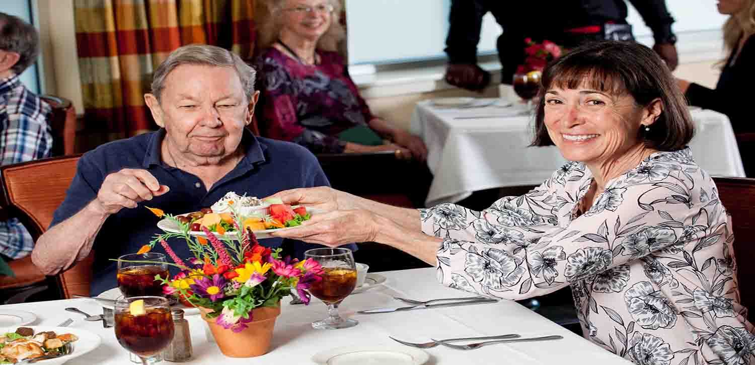 Husband and Wife Independent Residents Enjoying a Romantic Dinner