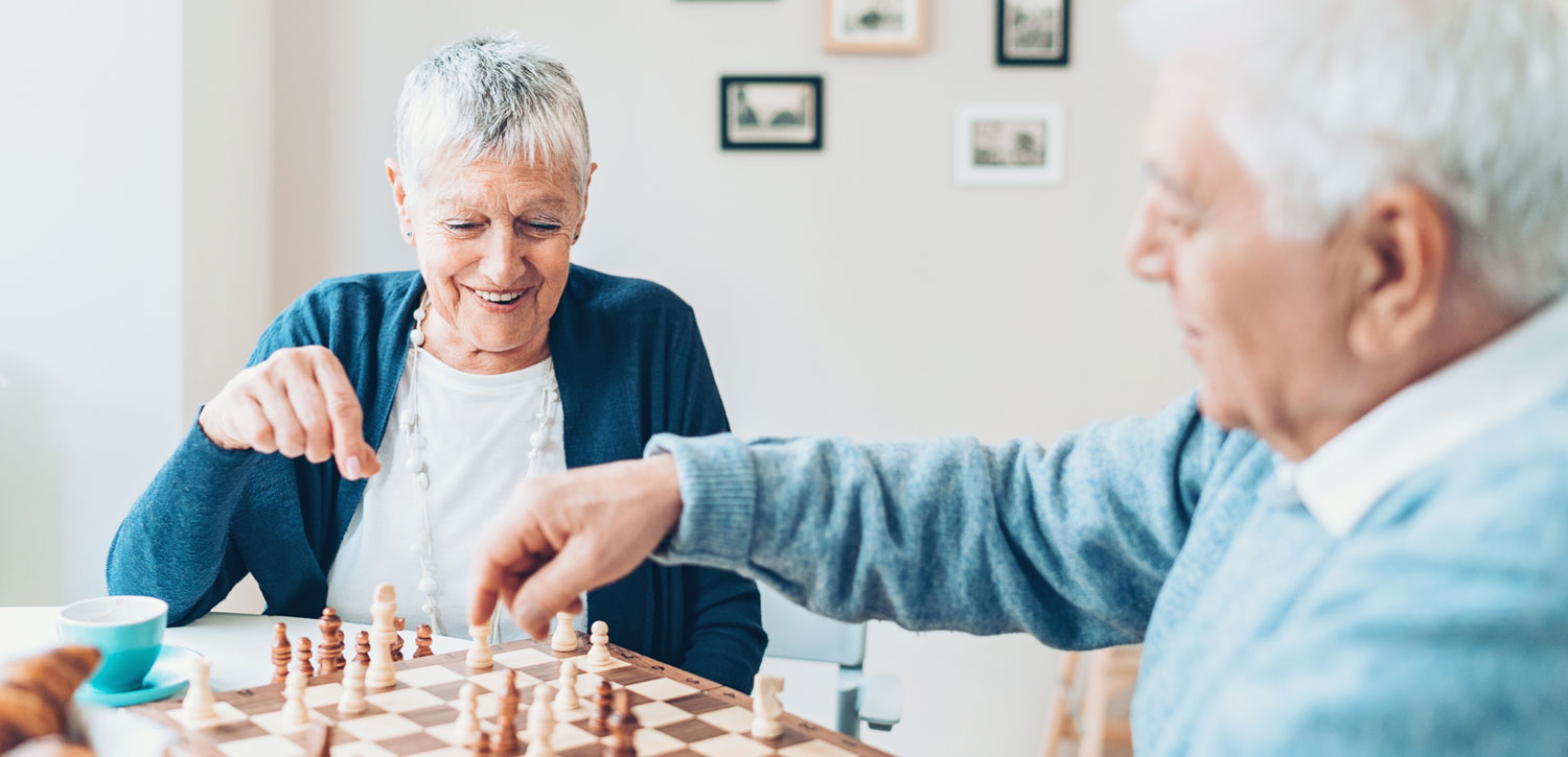 Senior couple playing chess