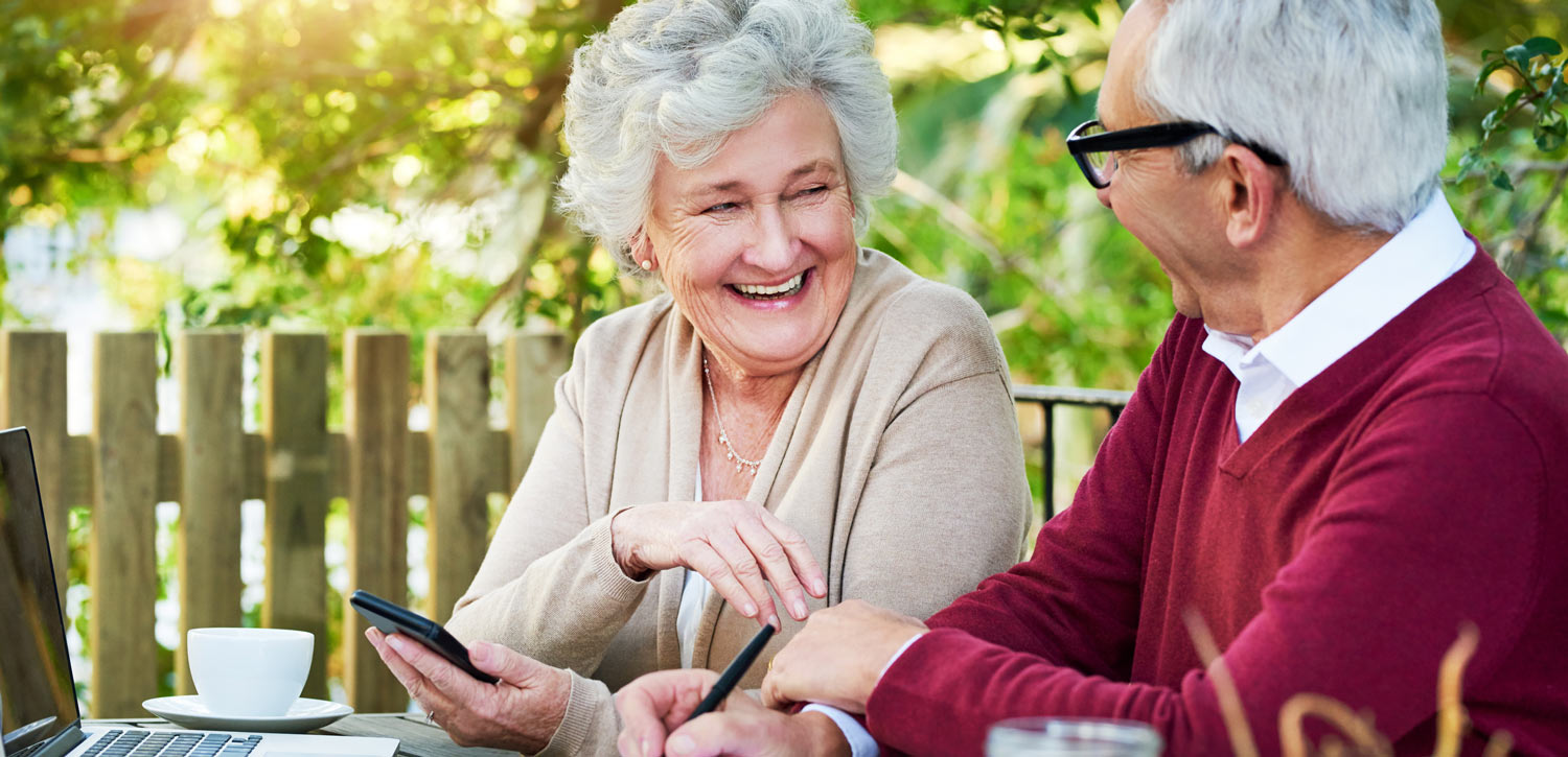 Senior and loved one chatting over tea