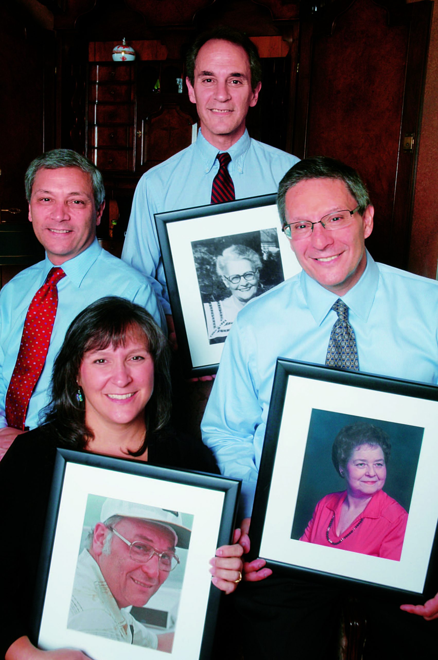 Abe’s Garden Community founder Michael Shmerling and other leadership team members hold photographs of family members affected by dementia Abe’s Garden Community founder Michael Shmerling and other leadership team members hold photographs of family members affected by dementia