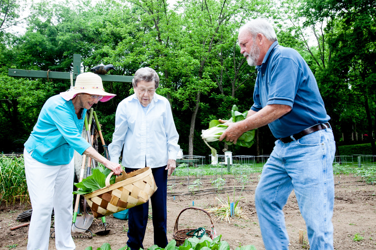 Senior Assisted Living Residents Gardening